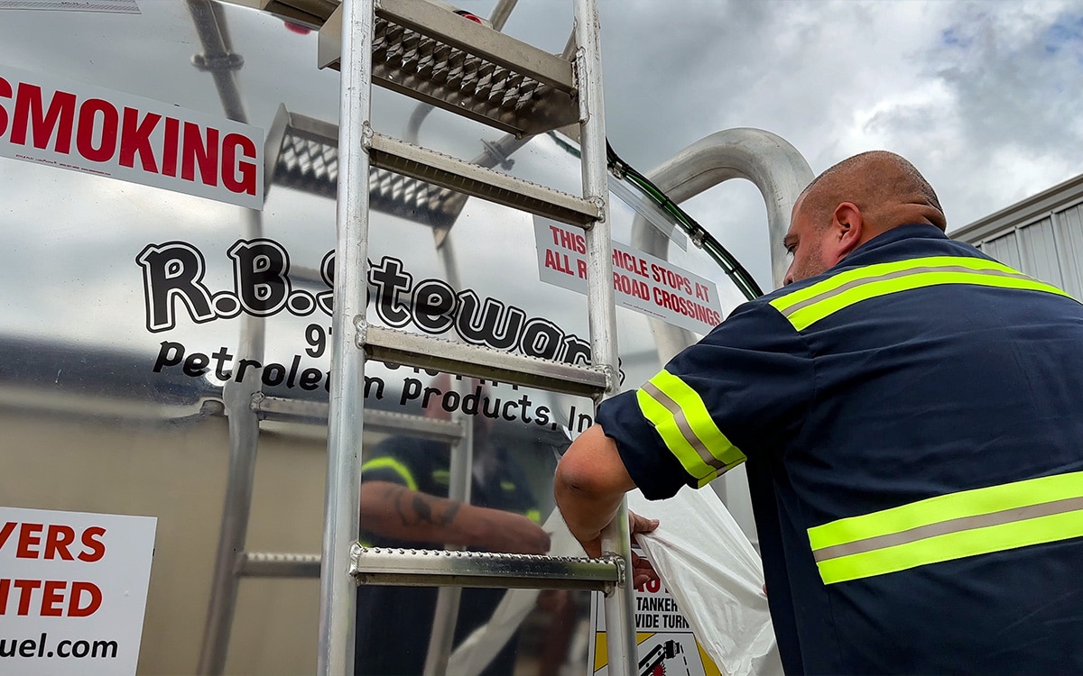 Team member outside a truck