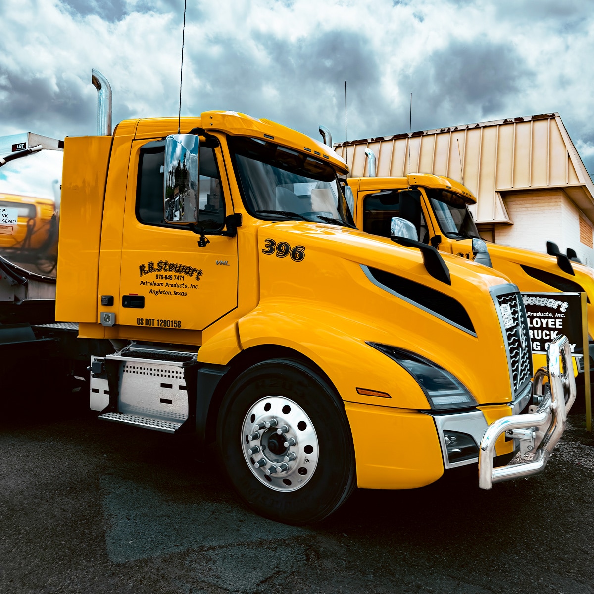 R.B. Stewart yellow trucks parked